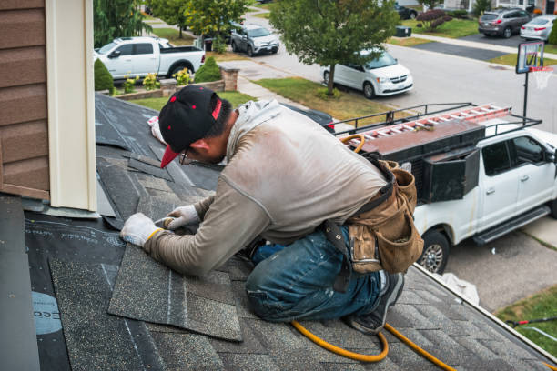 Professional Roofing technician working in Lakeville, MA
